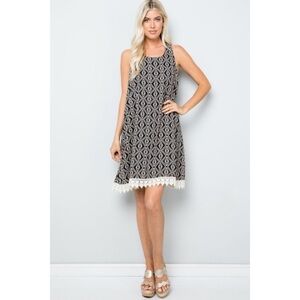 Nordstrom Black and White Mini dress,beautiful lace detailing. SZ L. 2 for $20